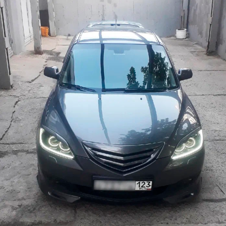 Накладки на фары (реснички) "Корнер" для Mazda 3 хэтчбэк (2003-2009) купить недорого с доставкой в Электросталь